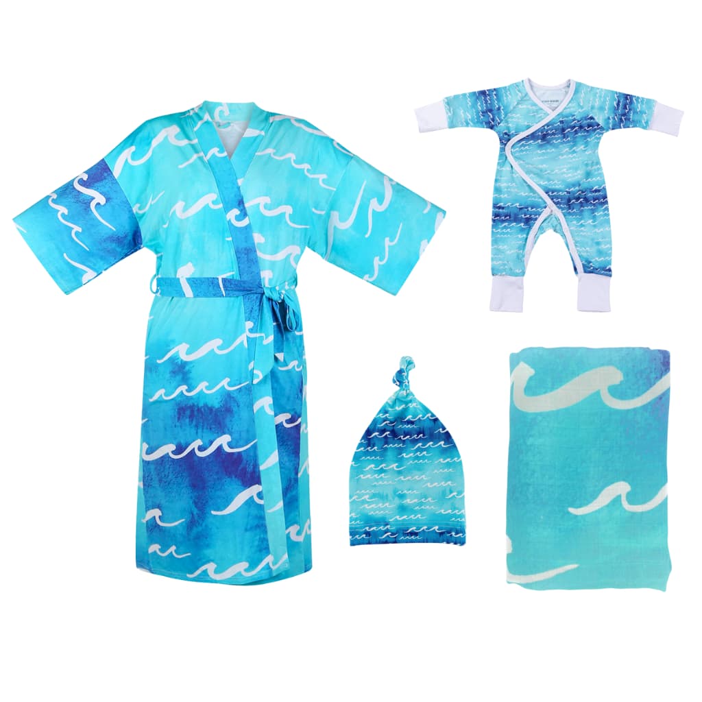Coordinated island-print mama robe, infant swaddle and hat for awake-time family moments